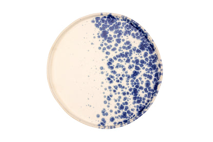 White charger plate with blue reactive dots 31cm